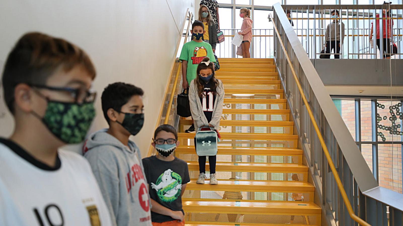Massachusetts schoolchildren wait to go into lunch