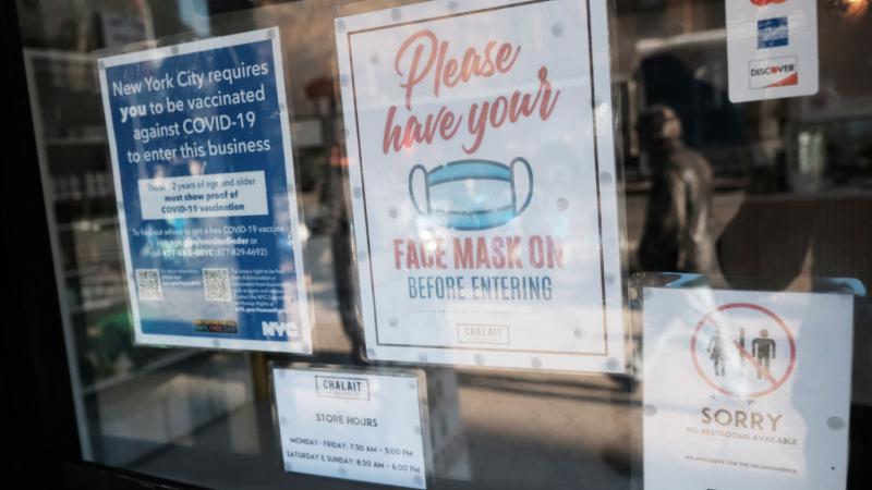 A face mask sign in New York City, Dec. 2021