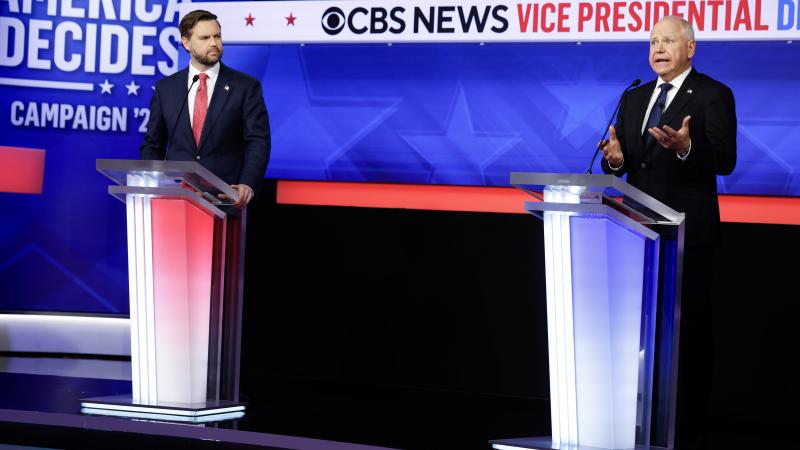 Republican vice presidential candidate, Sen. JD Vance (R-OH), and Democratic vice presidential candidate, Minnesota Gov. Tim Walz, participate in a debate at the CBS Broadcast Center on October 1, 2024 in New York City. 