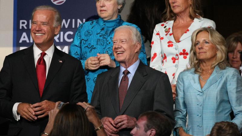 U.S. Sen. Joe Biden, former president Jimmy Carter, and Jill Biden watch the proceedings on day two of the Democratic National Convention (DNC) at the Pepsi Center August 26, 2008 in Denver, Colorado.